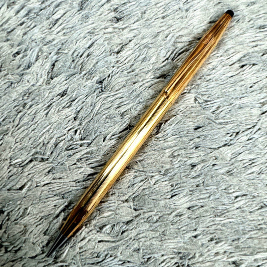 Cross 14KT gold twist mechanical pencil with slight scratches and light stains shown with its case