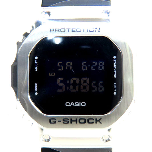 Casio G-Shock Metal Covered GM-5600U-1JF quartz watch with black metal case and digital display