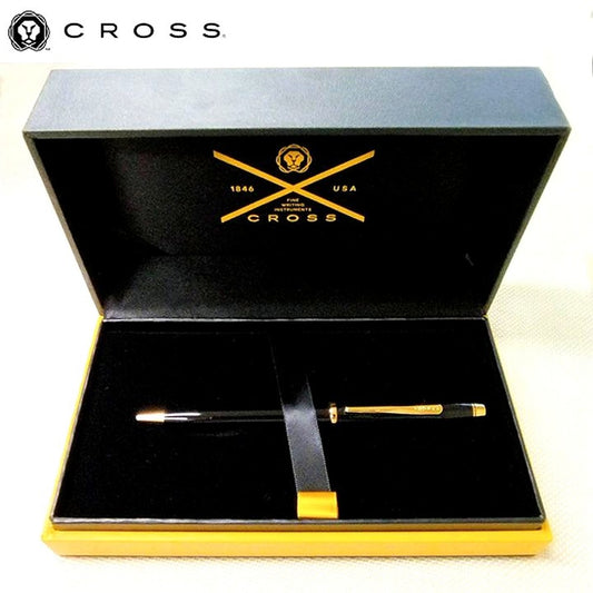 Cross Century II Black Lacquer ballpoint pen with gold clip and twist mechanism on a white background