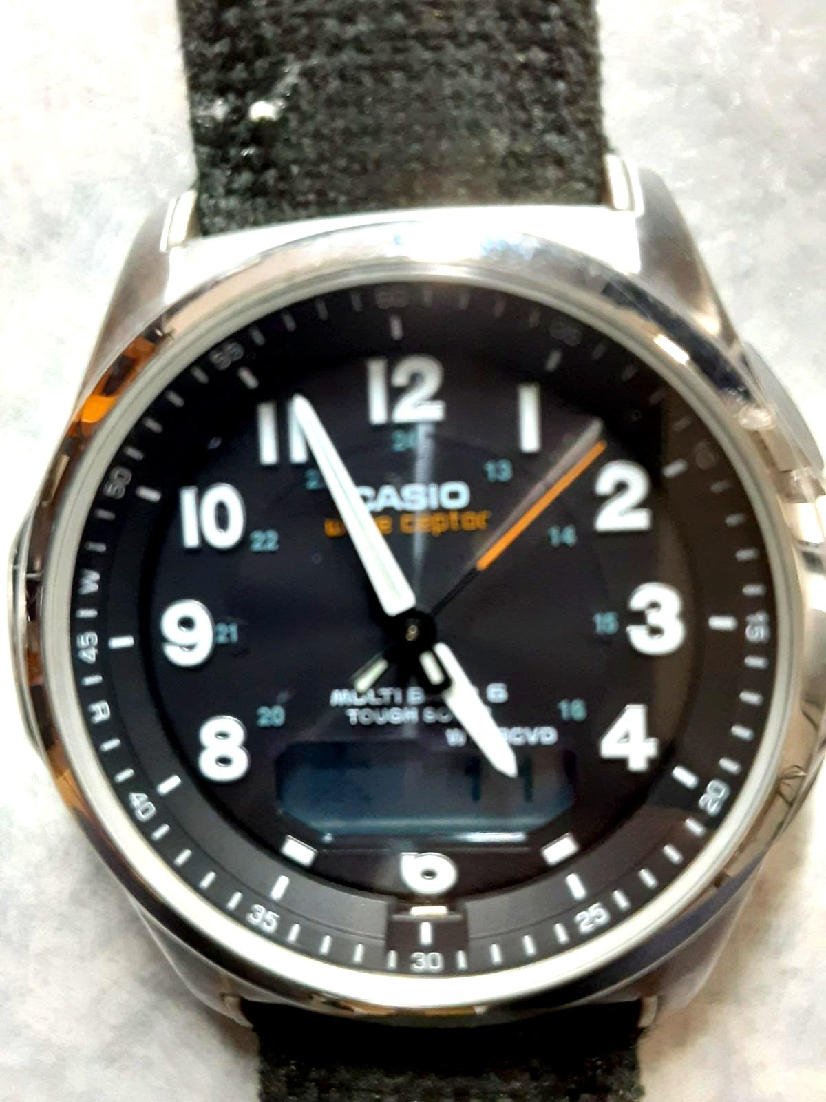 Casio Men’s Radio Solar Analog Watch Model WVA-M630B-1AJF with damaged band shown