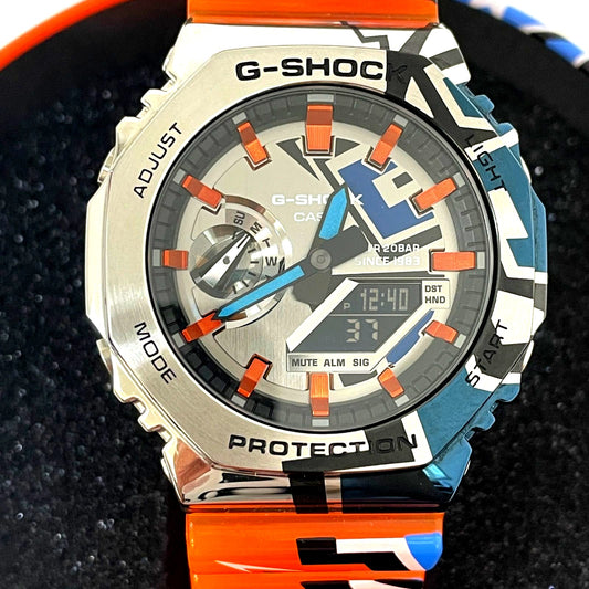 Casio G-Shock GM-2100SS-1AJR digital analog combination watch with metal case and orange band
