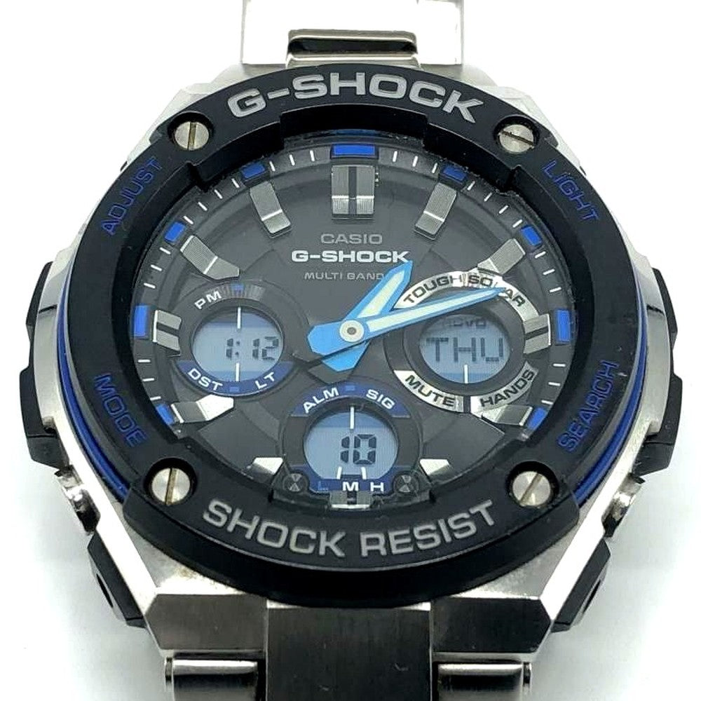 Casio G-Shock GST-W100D silver body watch showing front view with signs of wear
