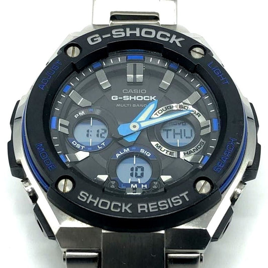 Casio G-Shock GST-W100D silver body watch showing front view with signs of wear