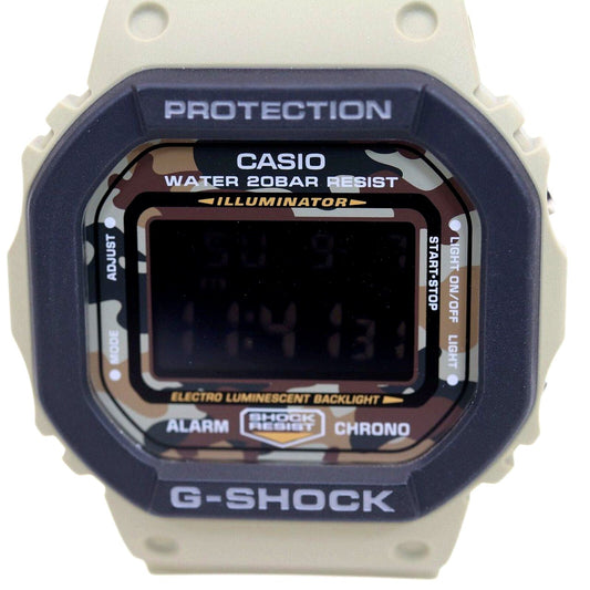 Casio G-Shock DW-5610SUS watch with khaki camouflage pattern and digital display