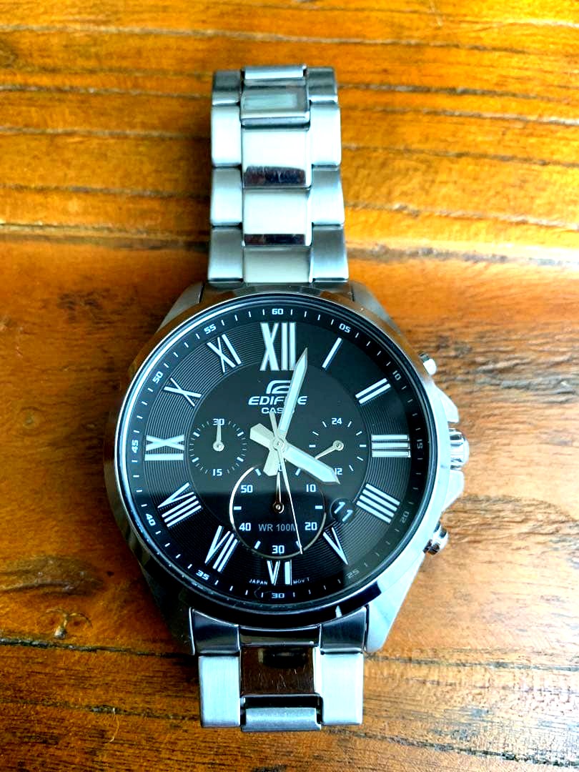 Casio Edifice Chronograph wristwatch with black dial, Roman numeral indices and stainless steel case