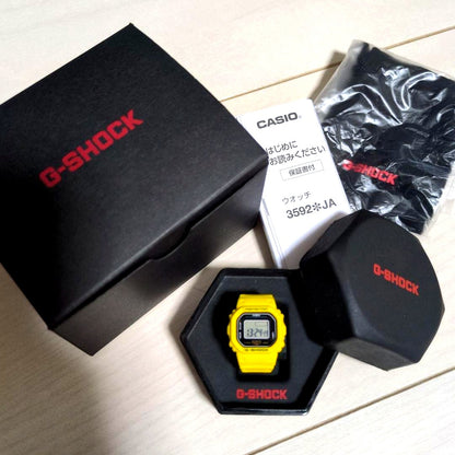 Casio G-Shock Nano DWN-5600-9JR yellow square ring watch with dedicated case and bag
