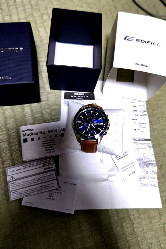Casio Edifice wristwatch Model 5434 5451 with blue dial and brown leather strap