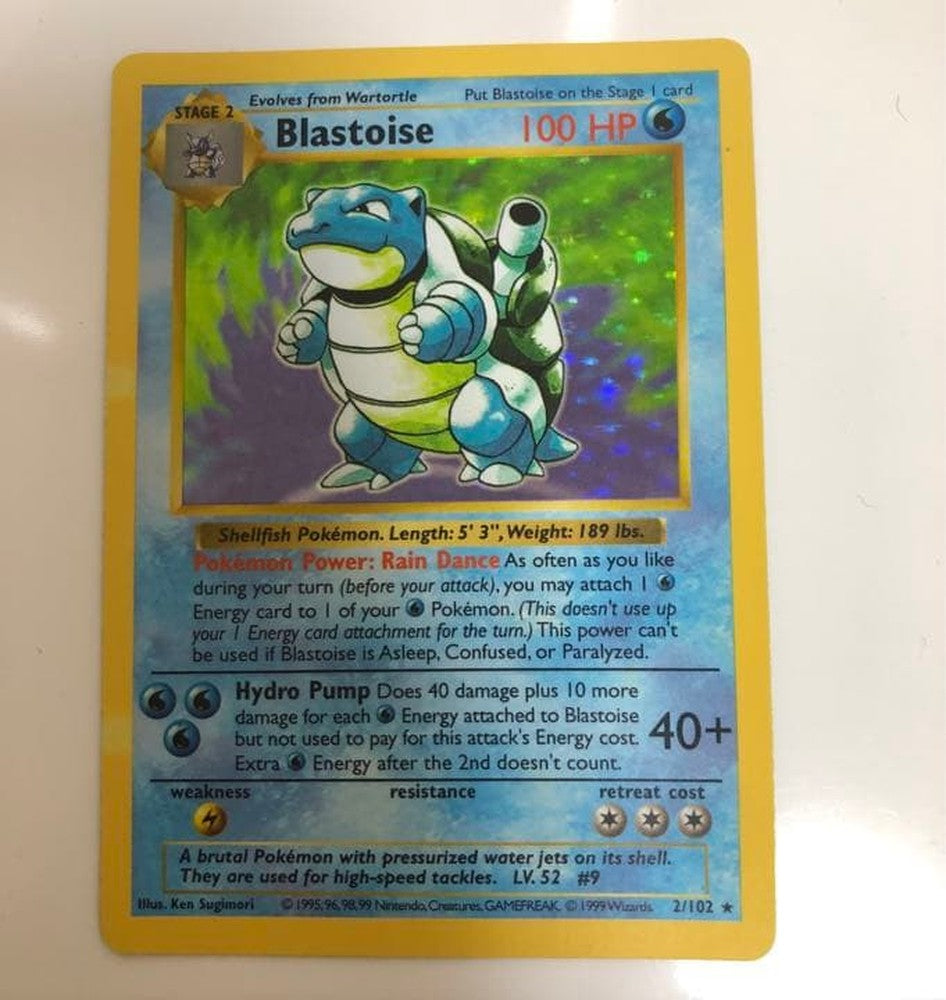 1999 Shadowless First Edition Blastoise Pokemon card English version showing front with minor back scratches