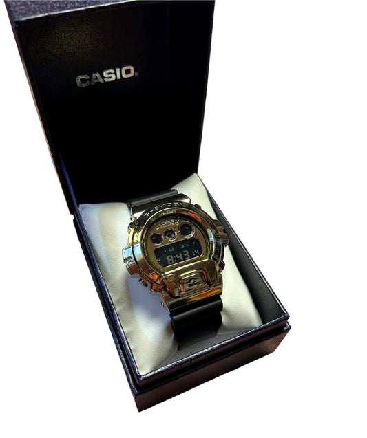 Casio G-Shock men's watch with metal cover, authentic Japan import, displayed on white background