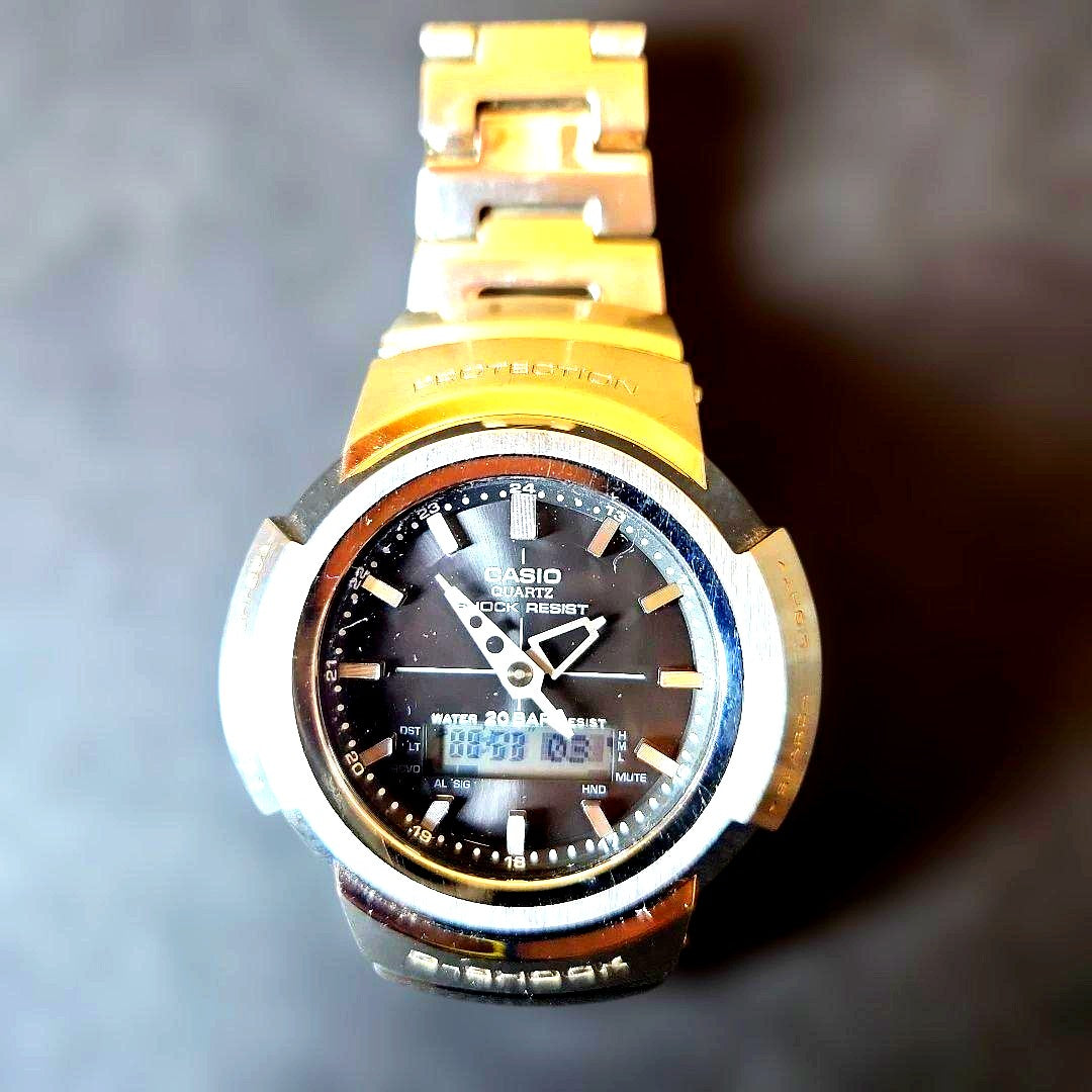 Casio G-Shock AWM-500D stainless steel wristwatch with digital analog display, used condition