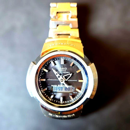 Casio G-Shock AWM-500D stainless steel wristwatch with digital analog display, used condition