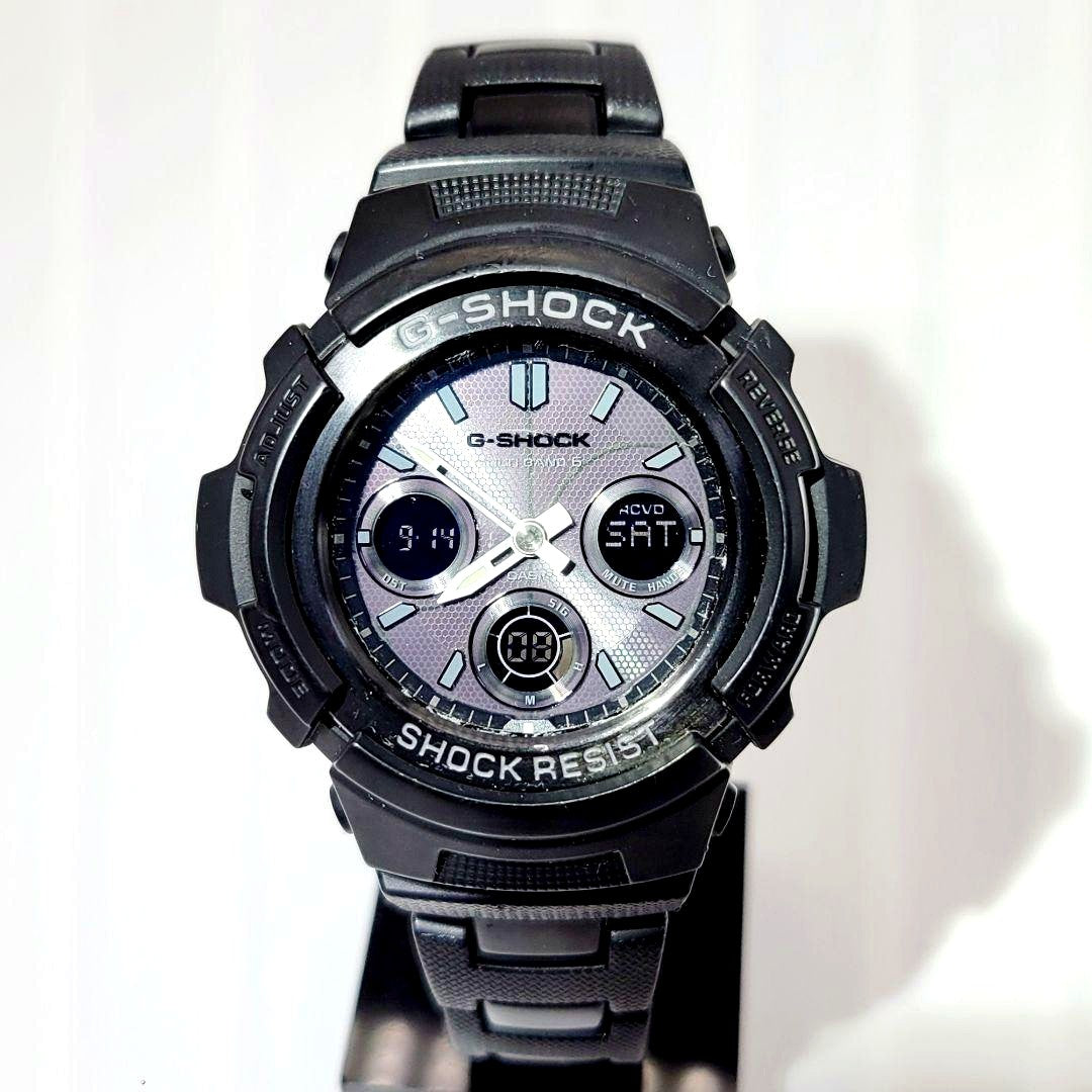 Casio G-Shock AWG-M100BC radio solar watch with metal band showing scratches and paint chipping