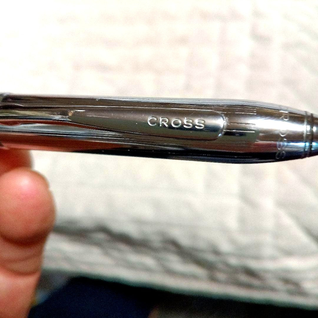 Cross metal ballpoint pen in silver with twist design shown on white background