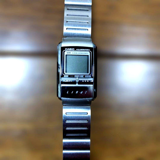 Casio LA-200 digital wristwatch with black strap and clear digital display Japan import