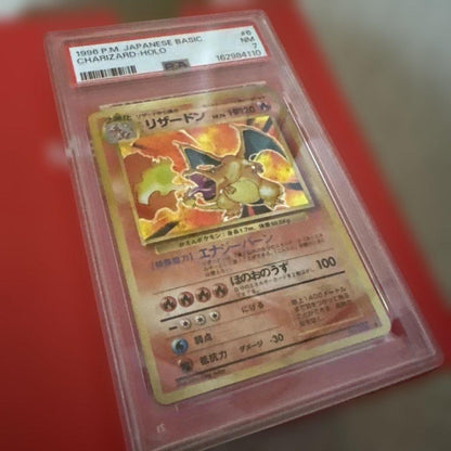 Bandai Pokémon Trading Card Game 1996 First Edition Kaen Charizard card in red PSA box Japan import