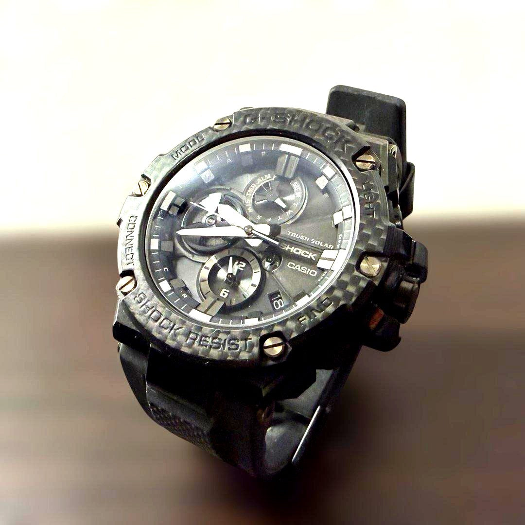 Casio G-Shock men's GST-B100 watch in carbon black with Bluetooth connectivity
