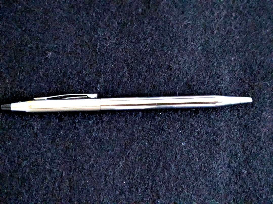 Cross Silver Ballpoint Pen Body with slim silhouette and glossy finish showing black fine-point ink
