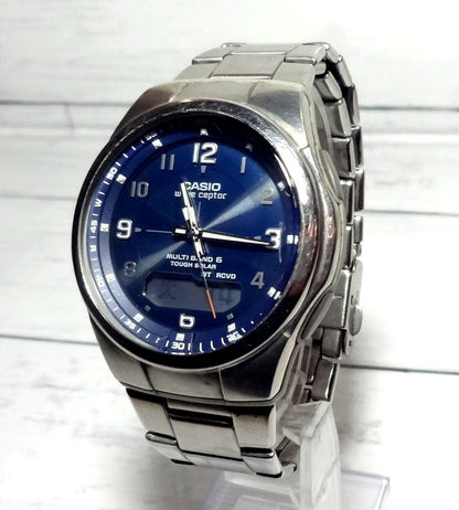 Casio Wave Ceptor WVA-M600 watch with navy dial, analog-digital display, and solar-powered radio control