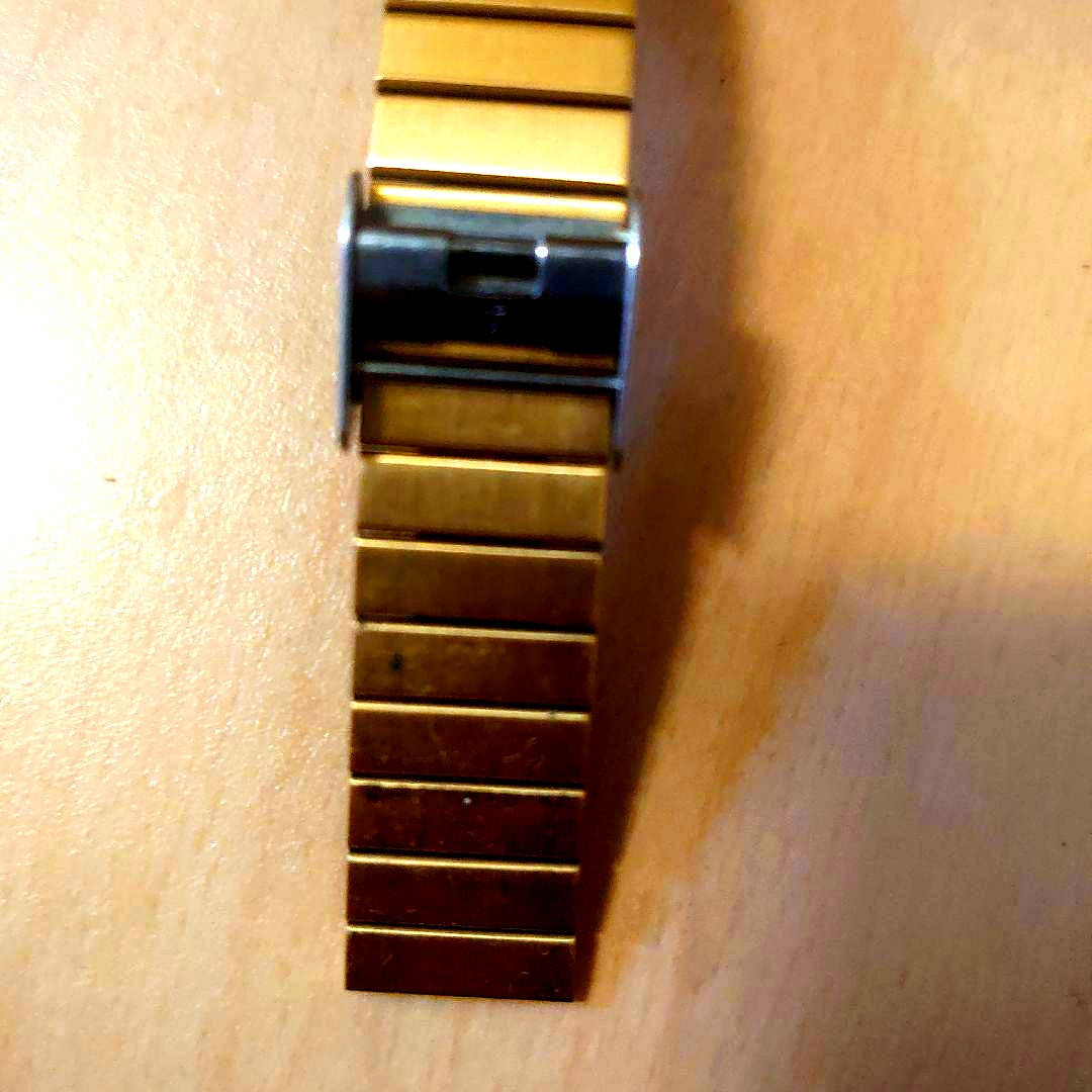 Casio A100WEG-9AJF digital watch in gold with stainless steel band and retro design