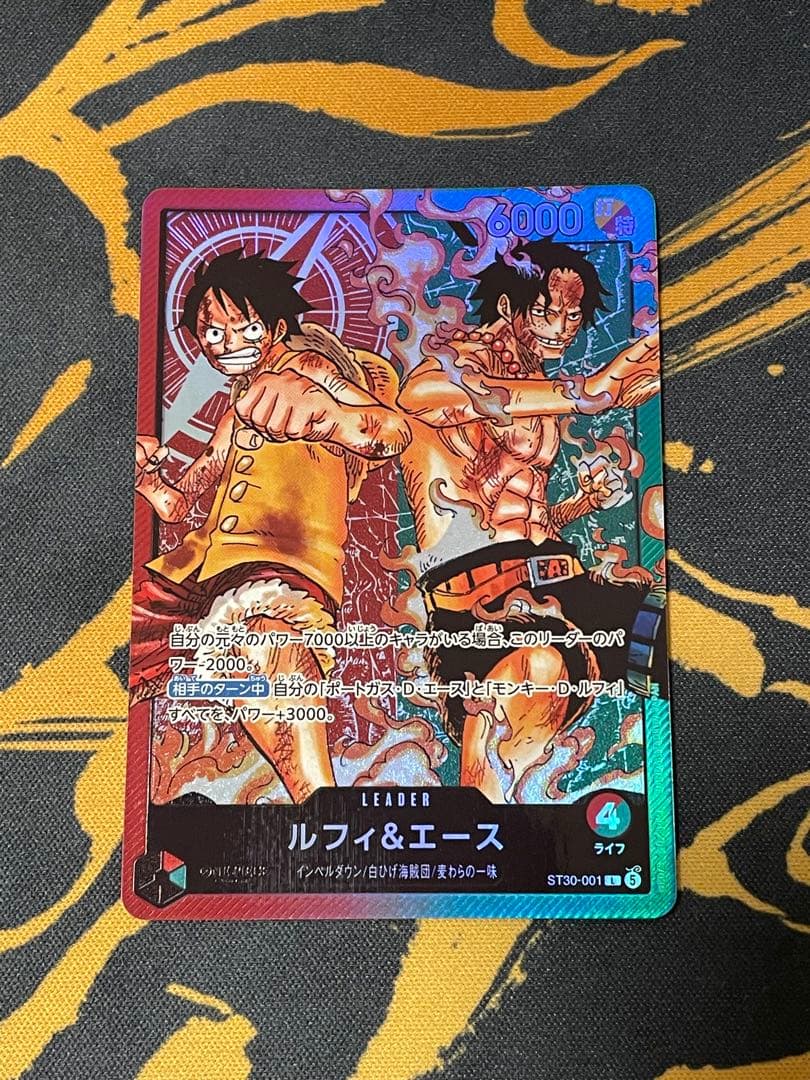 One Piece card showing Monkey D. Luffy & Portgas D. Ace Leader ST30-001 from Japan import