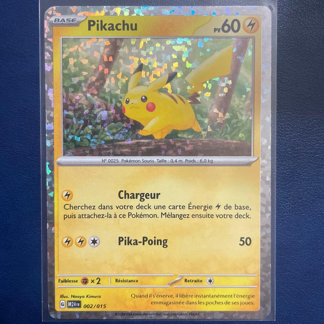McDonald's 2024 French Pikachu Holo Pokémon promo card in protective sleeve with minor wear