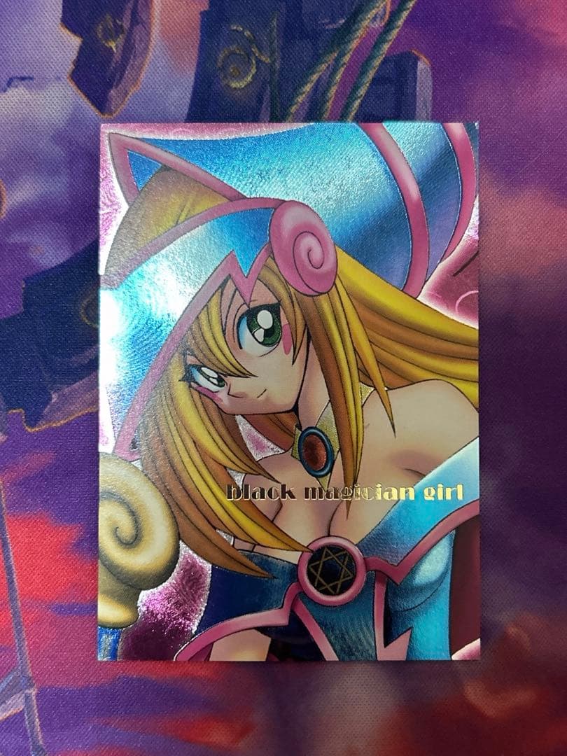 Yugioh Black Magician Girl Dungeon Dice Monsters ultimate rare secret rare monster card with gold text on pink background