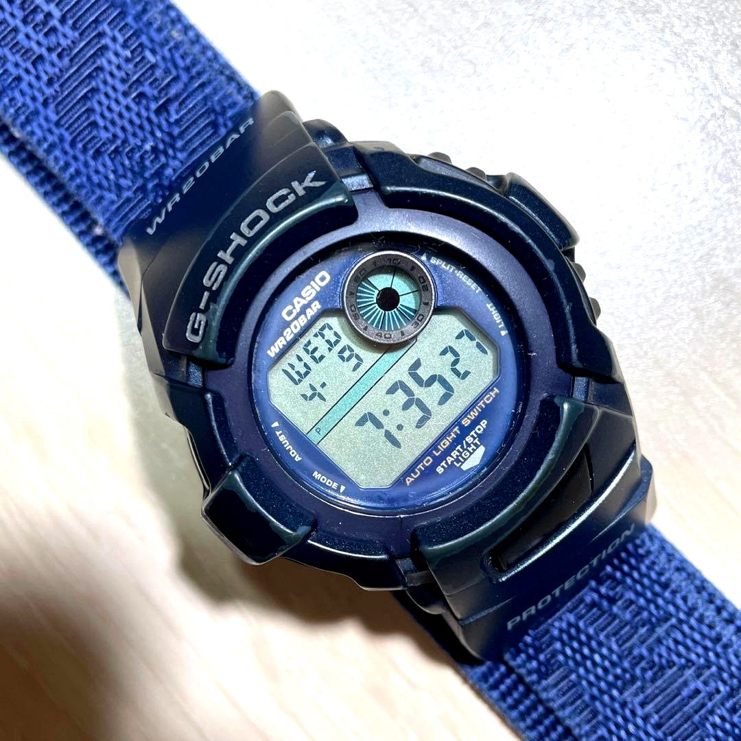 Casio G-Shock Under Your Spell watch with blue dial and unique dual dragon backlight