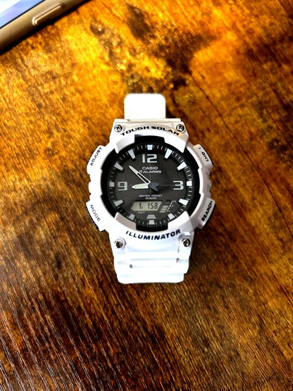 Casio Illuminator shock-resistant watch with white resin band and analog-digital display