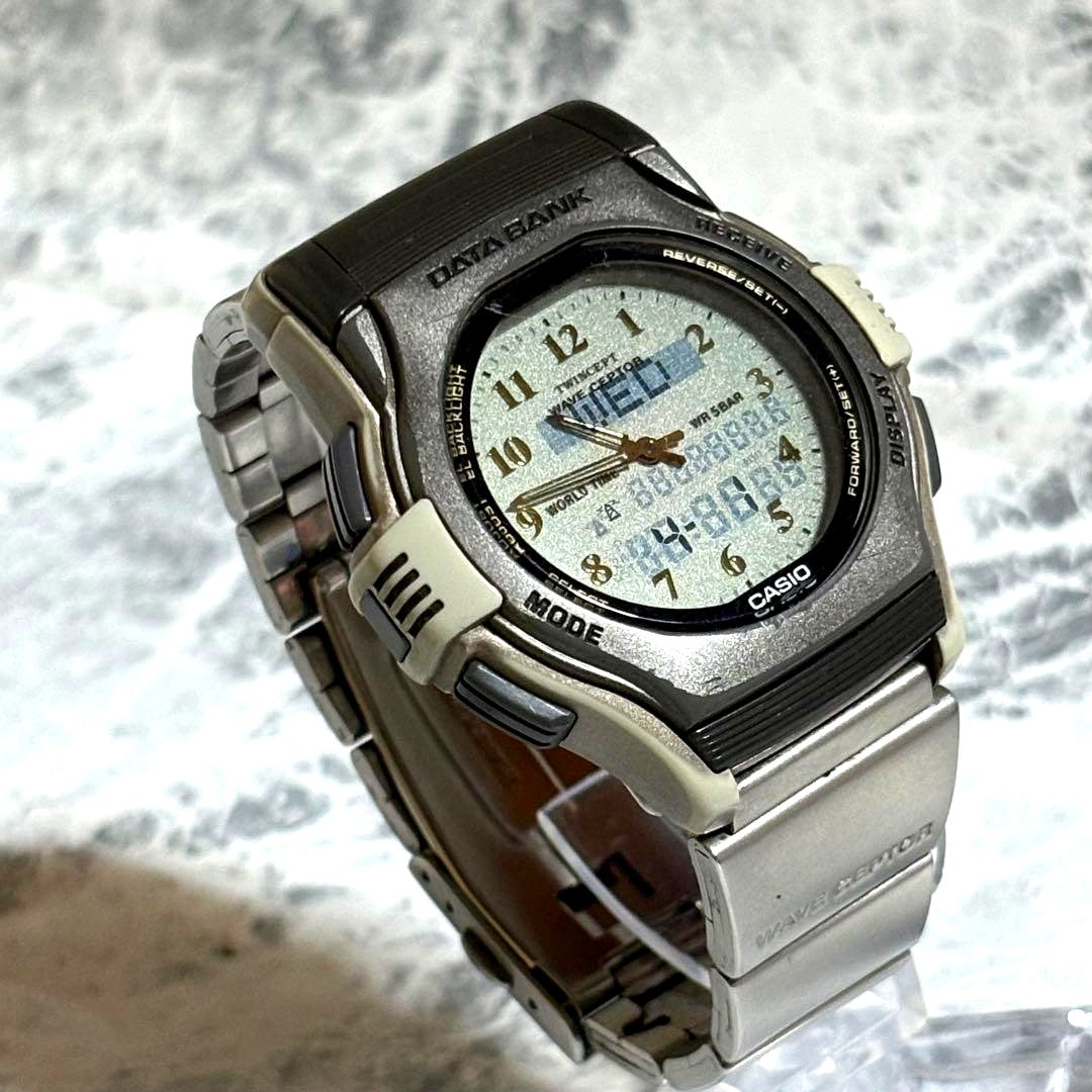 Casio Data Bank Twincept FKT-2000 radio wave watch with analog and digital display on black strap
