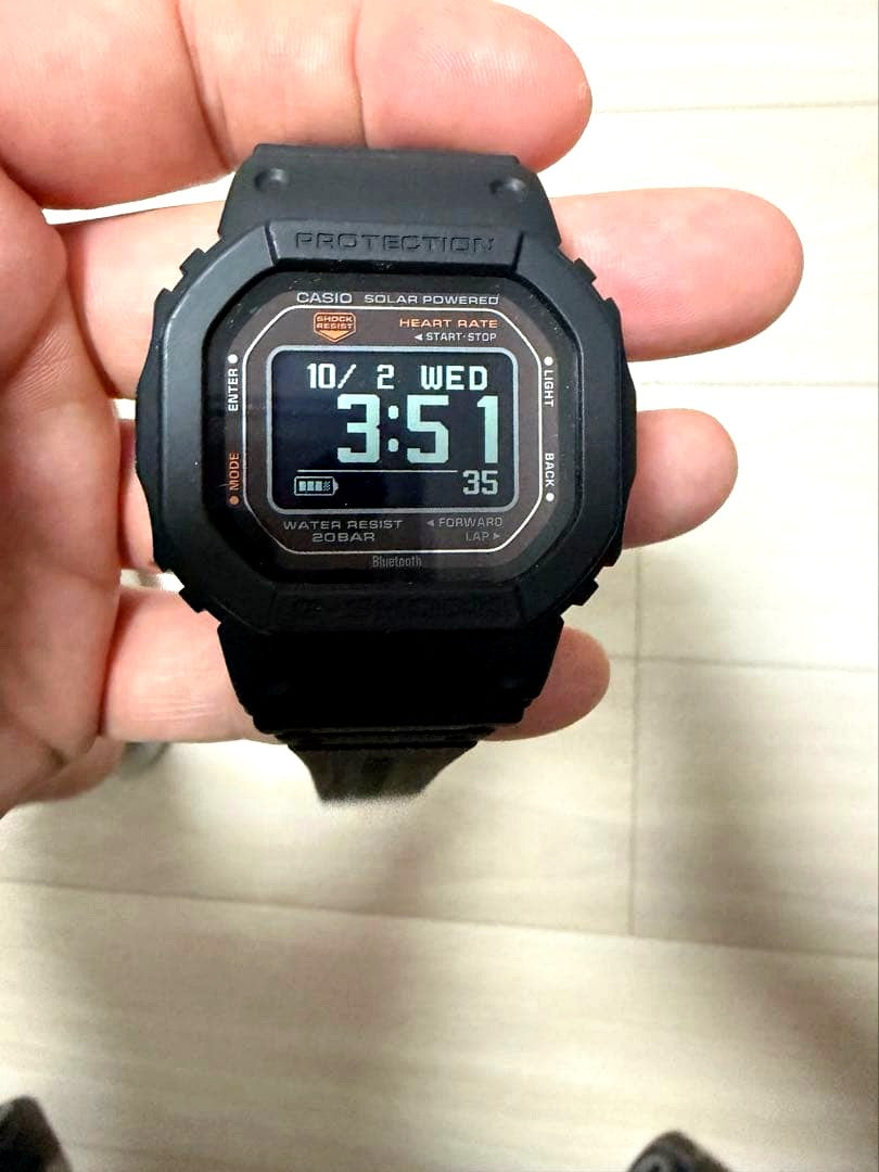 Casio G-Shock G-Squad DW-H5600 watch with Bluetooth and heart rate monitor on black band