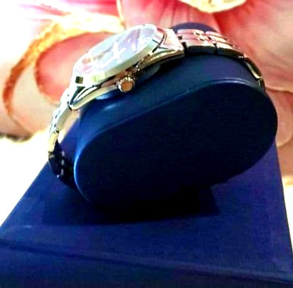 Casio Analog Quartz Wristwatch MTP 1335 with navy and silver stainless steel band showing date display