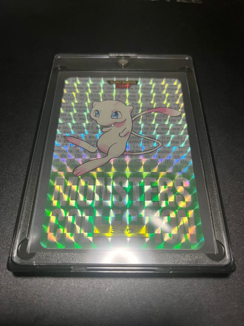 1996 Bandai Pokemon Monster Collection Mew trading card with green background