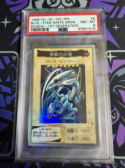 Bandai 1998 Blue-Eyes White Dragon First Edition Yu-Gi-Oh! card graded PSA8 in protective crystal pack