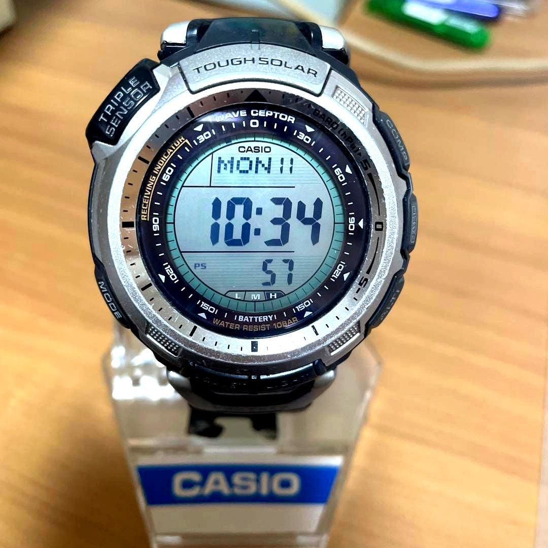 Casio PRO TREK digital watch with Tough Solar power and damaged band, shown from front