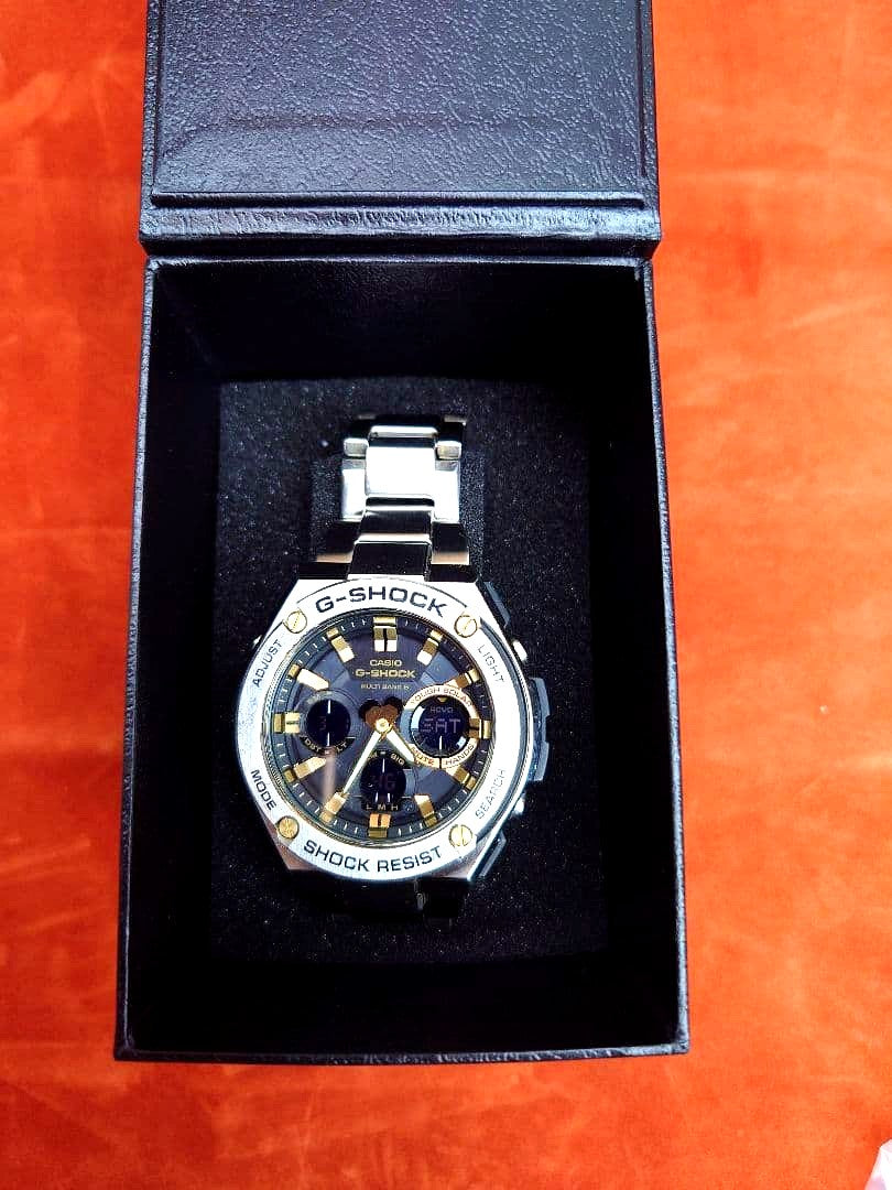 Casio G-Shock G-Steel GST-W1100D-1A9KJF silver and black quartz wristwatch with metal band