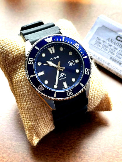 Casio Kaleido MDV-106 wristwatch with navy blue dial and silicone strap, stainless steel case