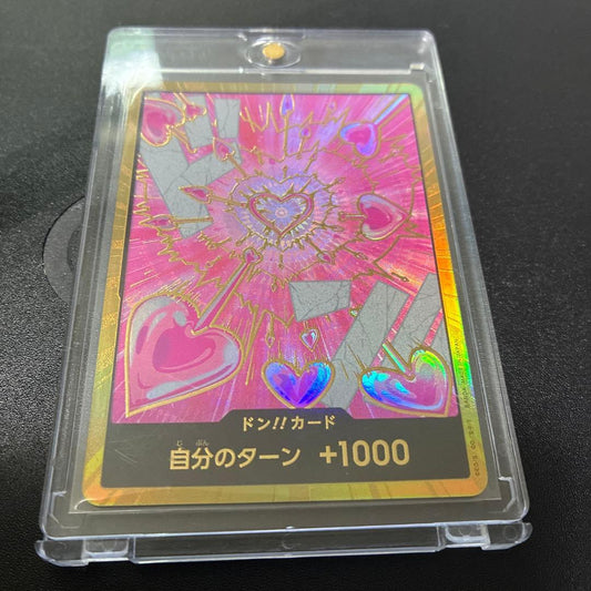 One Piece Card Game Don Card with heart-pattern hologram featuring Hancock in gold hologram design