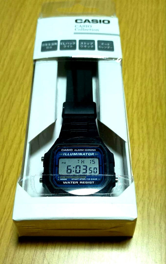 Casio F-105W digital wristwatch in unopened condition with classic black resin strap and digital display