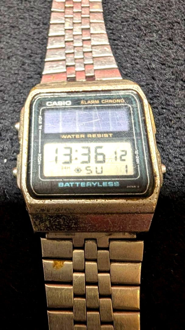 Casio AL-180 digital watch with stainless steel case and waterproof battery-free design