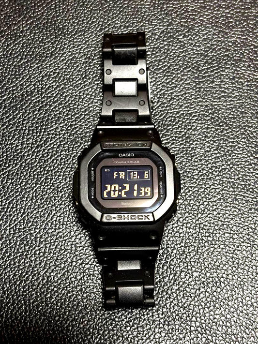 Casio G-Shock GW-B5600BC-1BJF Bluetooth watch in black with adjustment links and protector