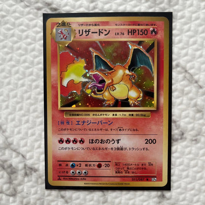 Bandai Pokémon Charizard trading card 011/087cp6 20th Anniversary edition in protective sleeve
