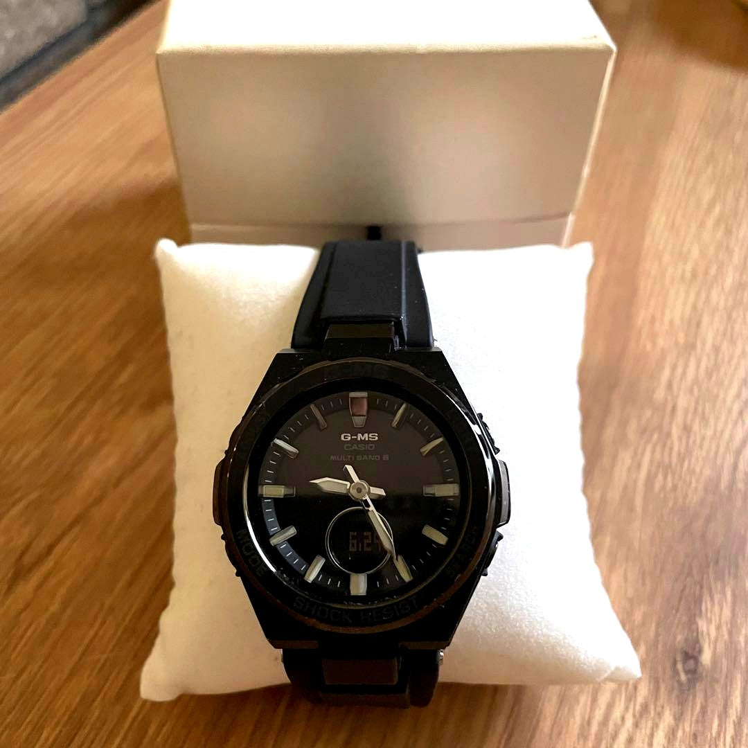 Casio G-MS black solar powered watch shown on a white background with clear display