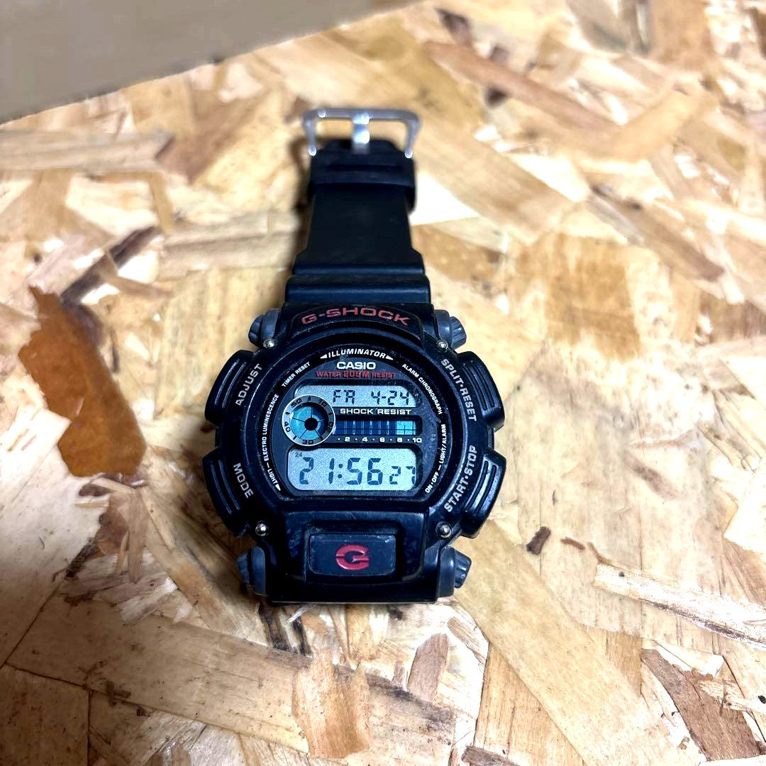 Casio G-Shock DW-9052-1V black digital watch with minor wear and scratches