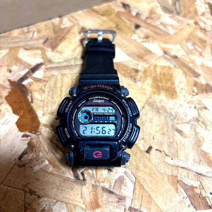 Casio G-Shock DW-9052-1V black digital watch with minor wear and scratches