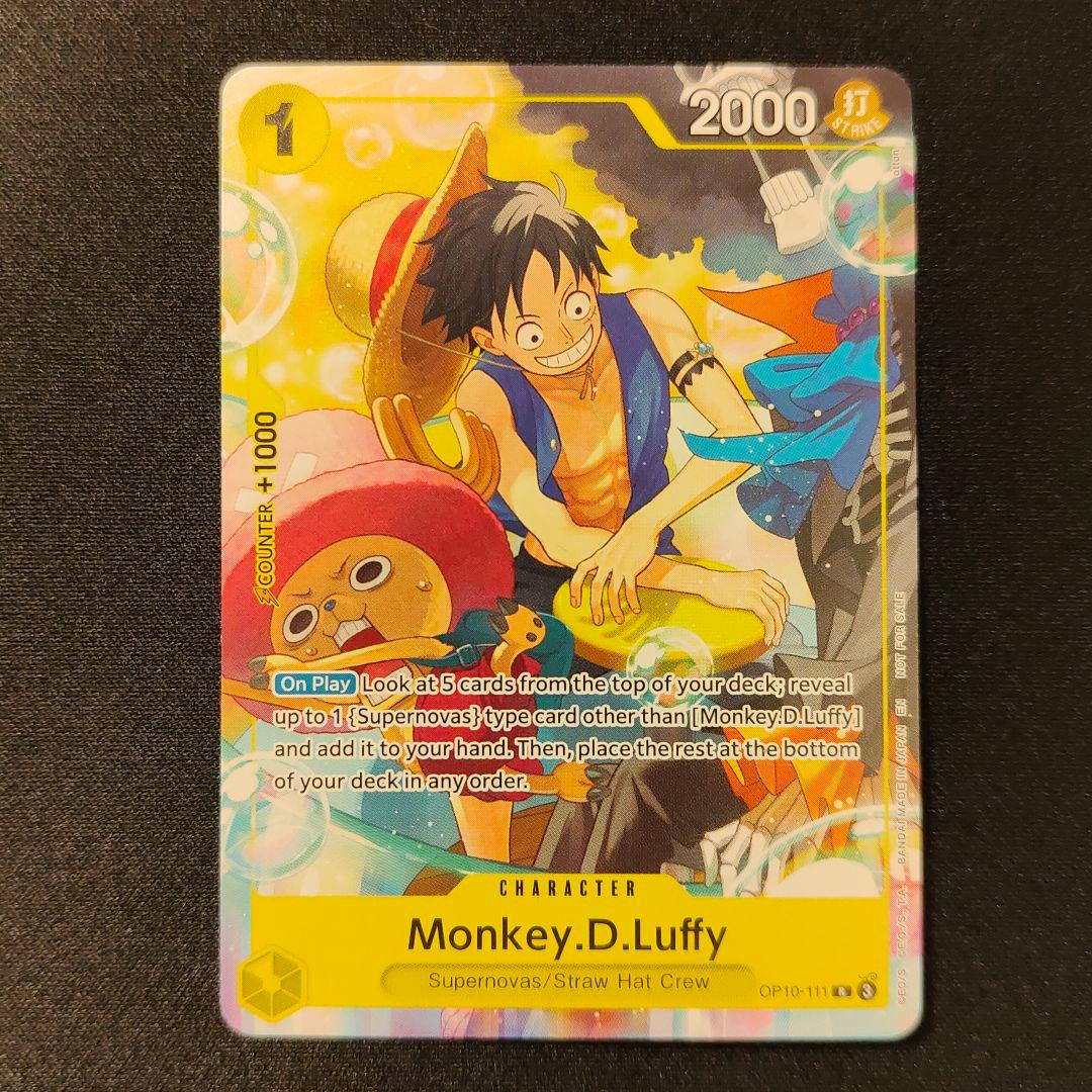 Anime Monkey D Luffy Welcome Pack Promo card showing fine fiber edges stored in protective sleeve