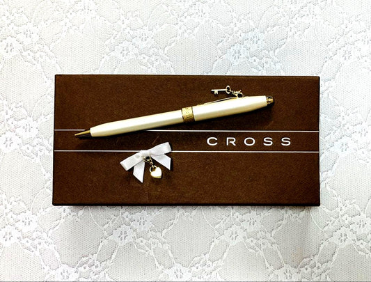 Used Cross ballpoint pen with key and heart shaped charms in original case and pen pouch