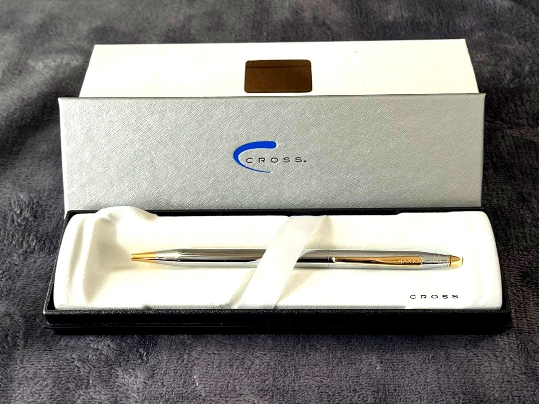 Cross Classic Century ballpoint pen with chrome body and gold-plated clip and accents in a gift box