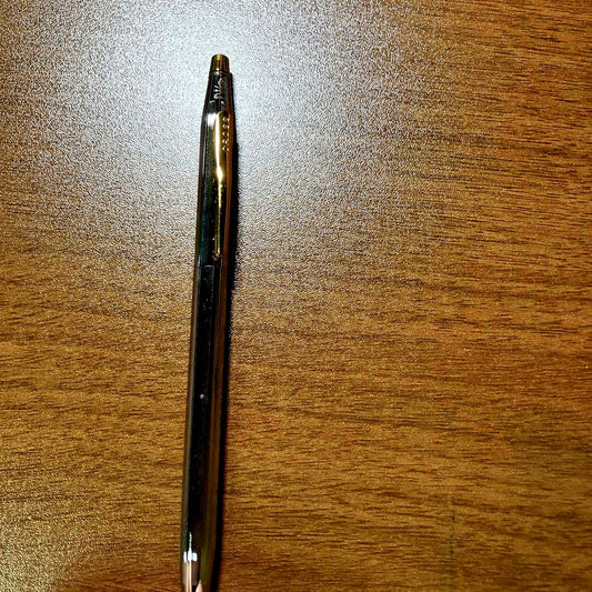Cross Classic Century Twist Ballpoint Pen with gold and silver finish and slim silhouette