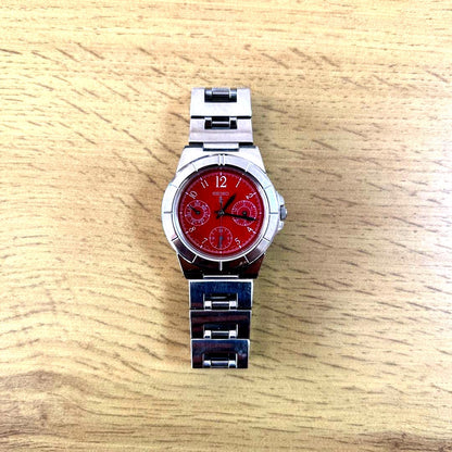 Casio Lucia ladies chronograph watch with red dial and round stainless steel case