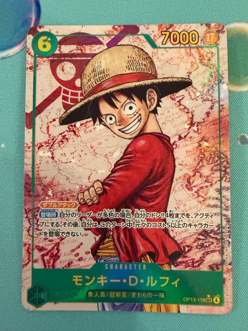 Monkey D. Luffy OP13 Secret Parallel trading card from One Piece series showing front design